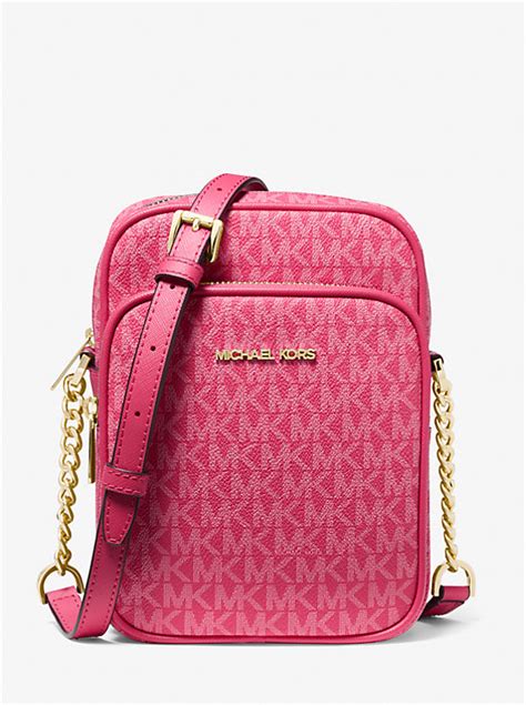 michael kors jet set travel bruin|Jet Set Travel Medium Signature Logo Crossbody Bag .